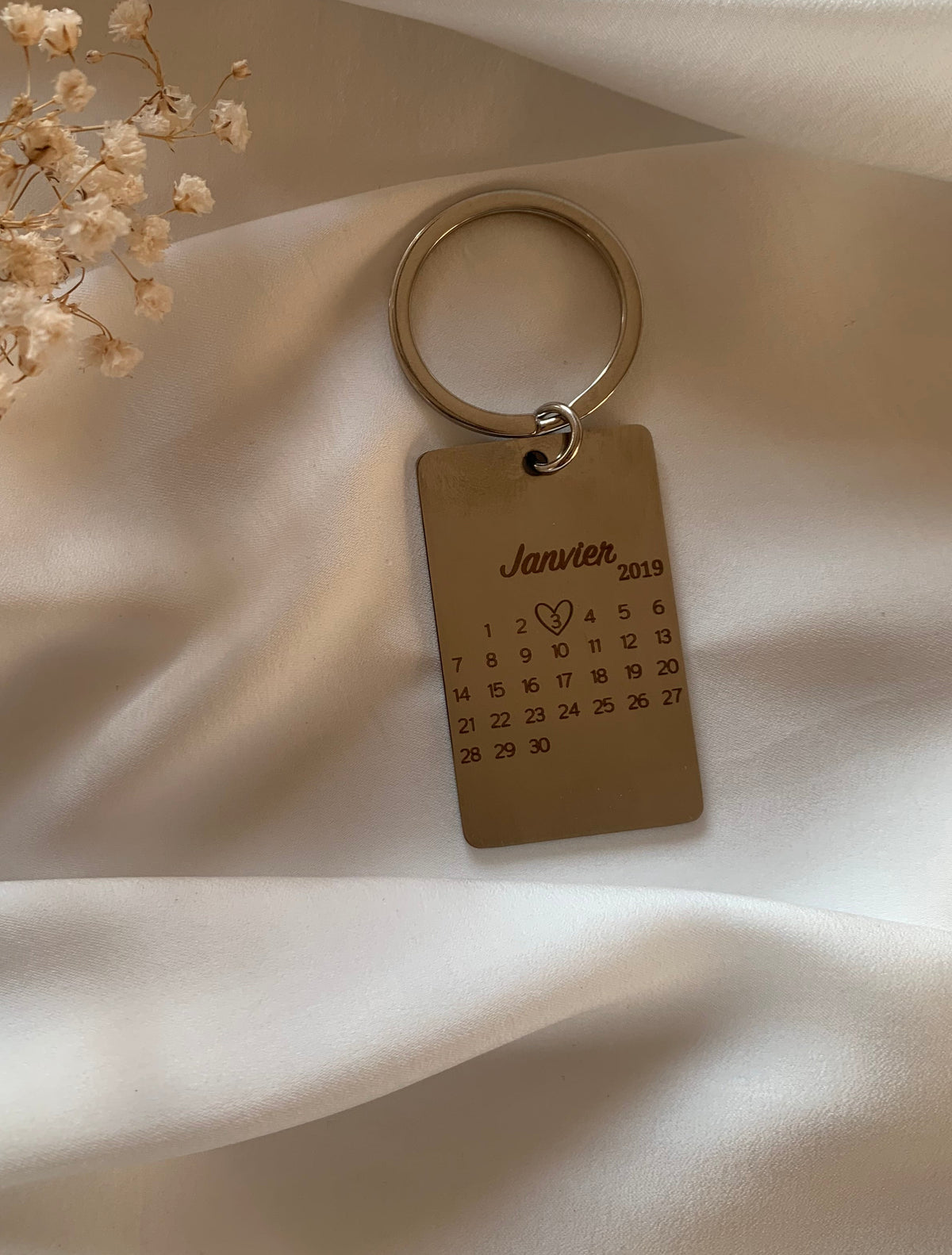 Porte clé date
