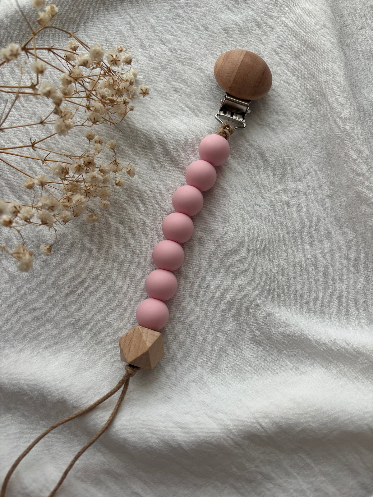 Attache tétine rose bébé